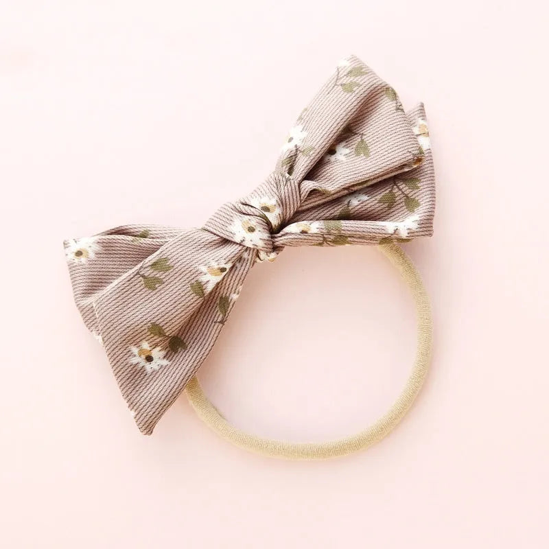 Children's knotted bow hair ring in cloth fabric with printed princess series design