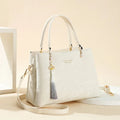 Women's PU leather shoulder bag with horizontal square shape and slit pockets in ethnic-style finish