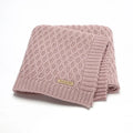 Solid colour acrylic infant hug blanket with three-dimensional lines, shown in a light green colour.