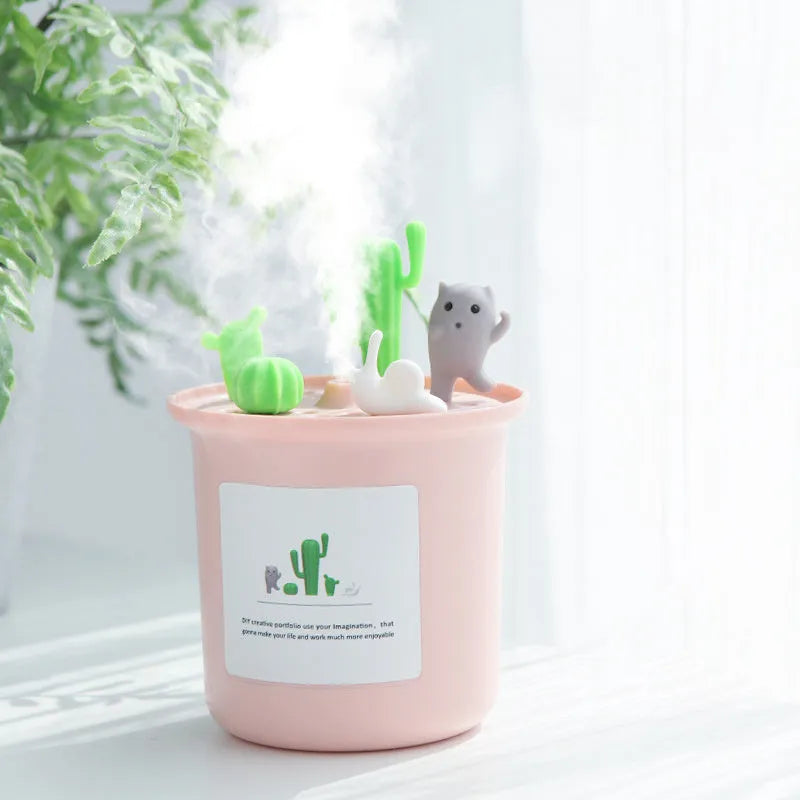 Vase-shaped USB pet humidifier in cherry blossom pink on a table