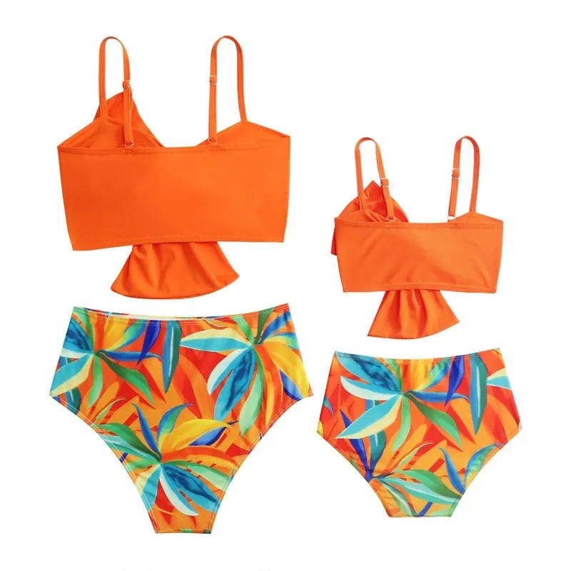 Women's bikini swim set with big bow design on nylon swim trunks in multiple colour options