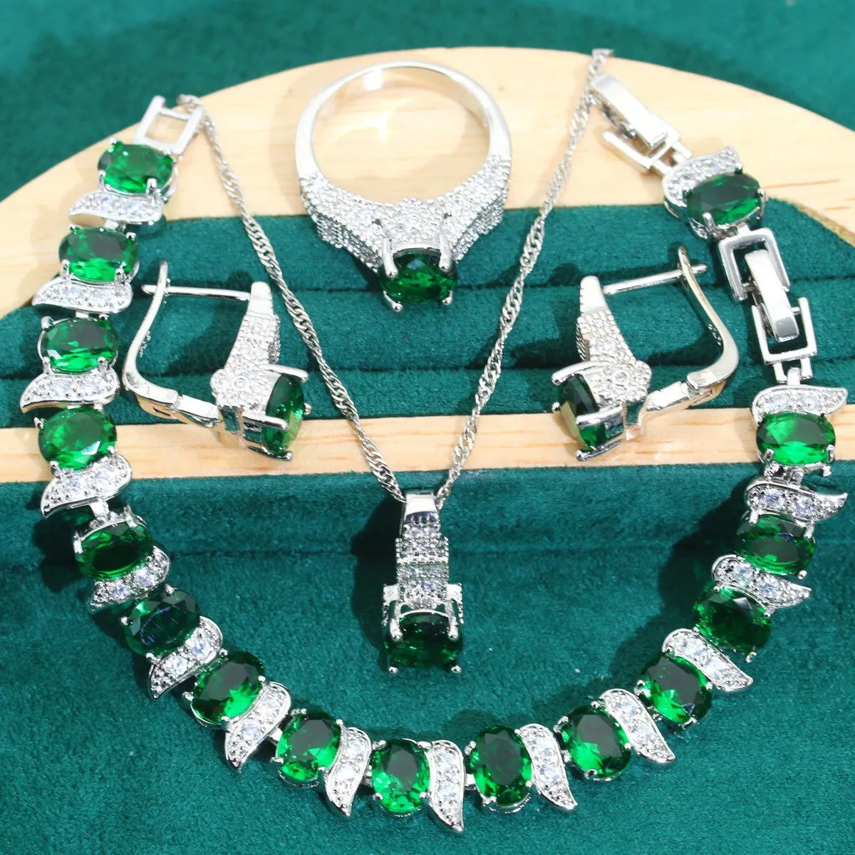 Four-piece bridal jewellery set showing necklace, bracelet, earrings and ring with alloy zircon and water wave chain design