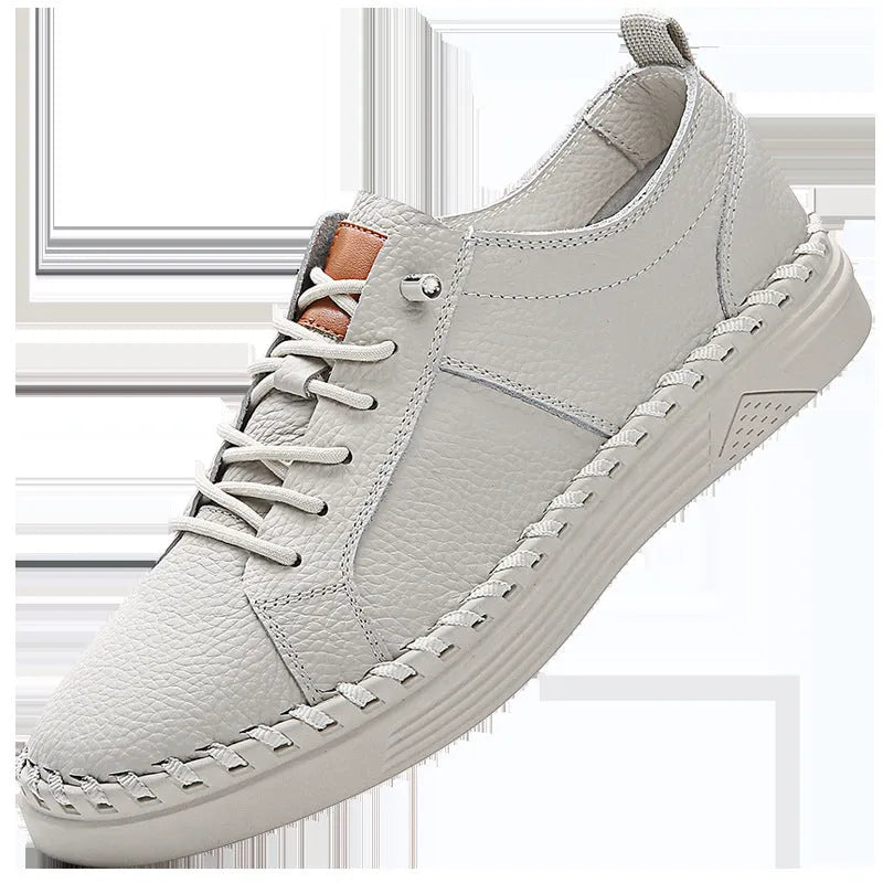 Men's beige and black round toe casual sneakers made from first layer cowhide with visible stitching.