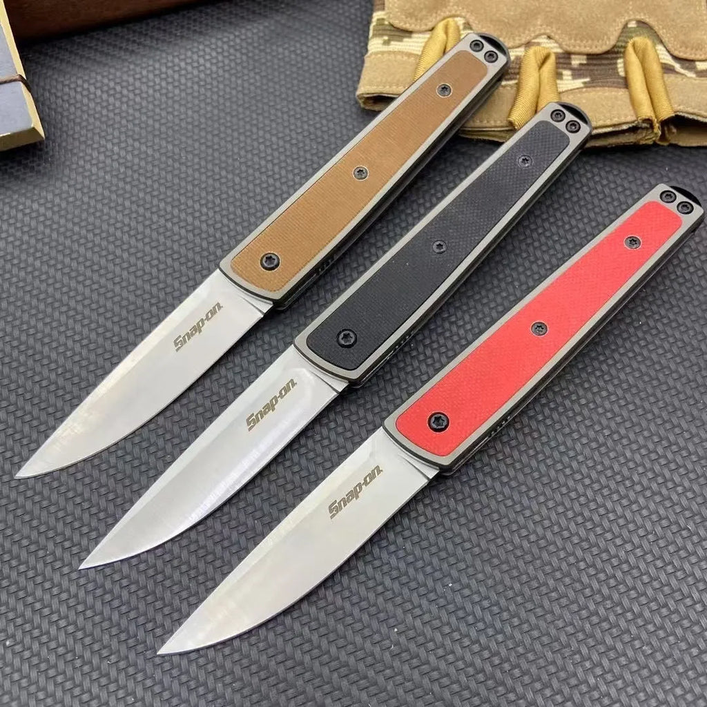 Handmade folding fruit knife with stainless steel blade shown open, in black, red, or brown colour options.
