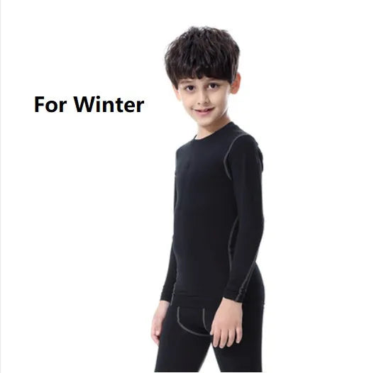 Children's black and green sportswear set showing T-shirt, trousers, and shorts on a size chart.