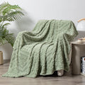 Velvet jacquard sofa blanket in soft polyester fabric with plant flower pattern