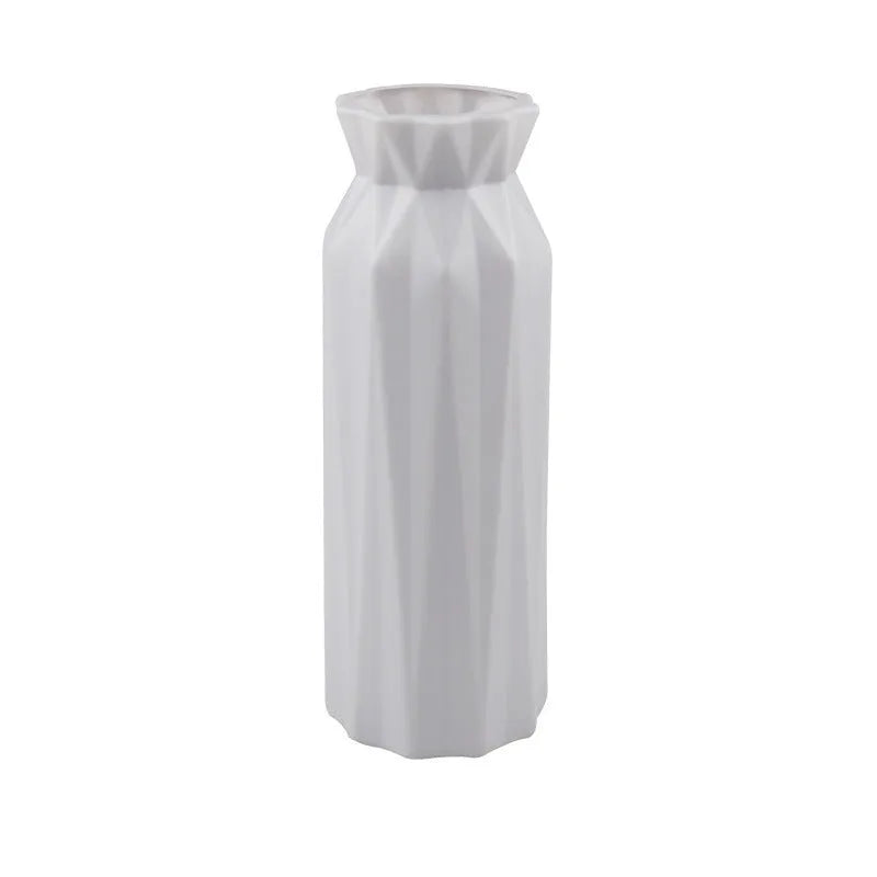 Drop-resistant plastic melamine vase in green, grey, pink, or white colour on a table.