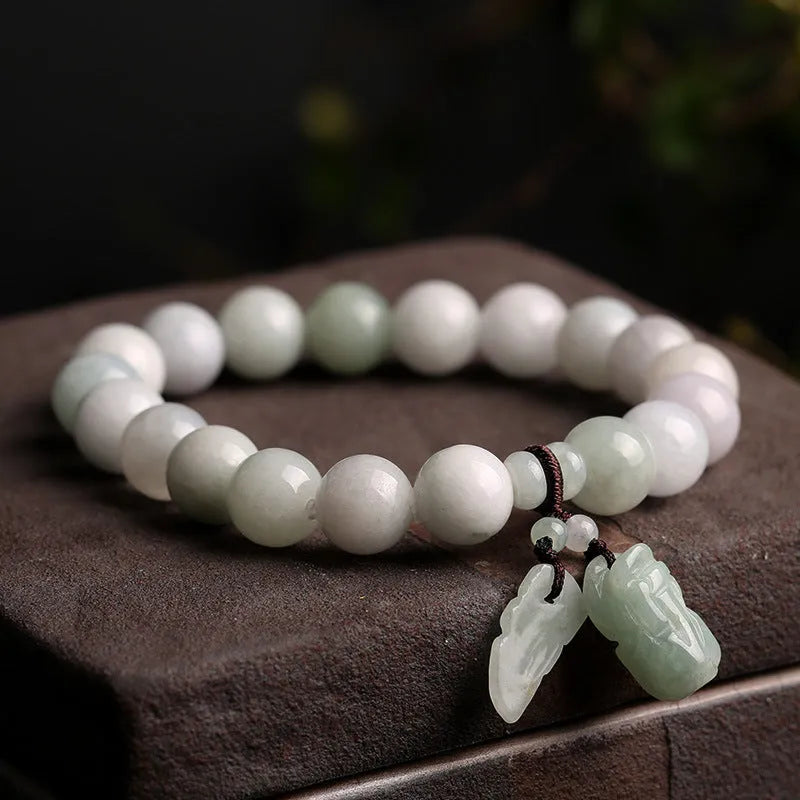 Natural green jade bracelet with geometric pendant featuring Maitreya Buddha design for women.