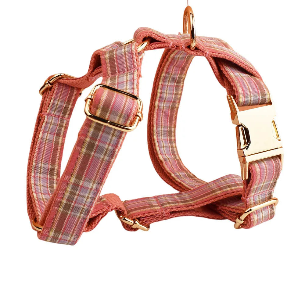 Plaid dog collar and matching leash set with decorative bow and vest for special occasions