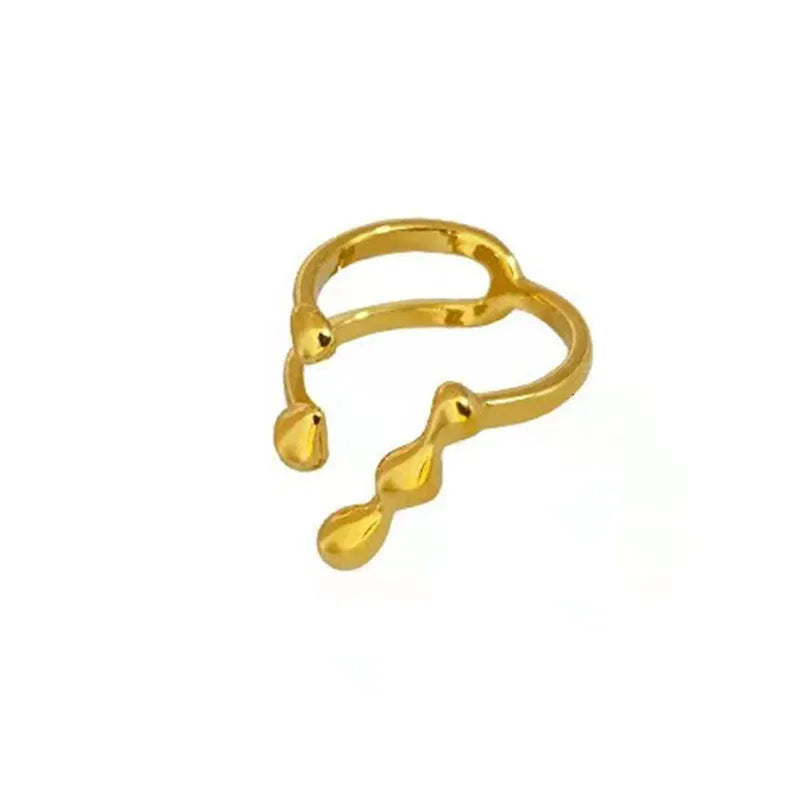 Brass spherical ring for women in gold or silver plating.