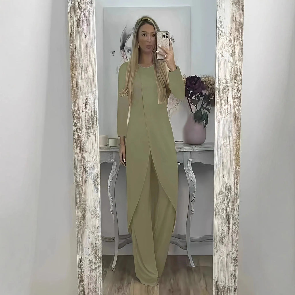 Casual long sleeve two-piece loungewear set in a neutral colour, showing the loose round neck top and matching trousers.