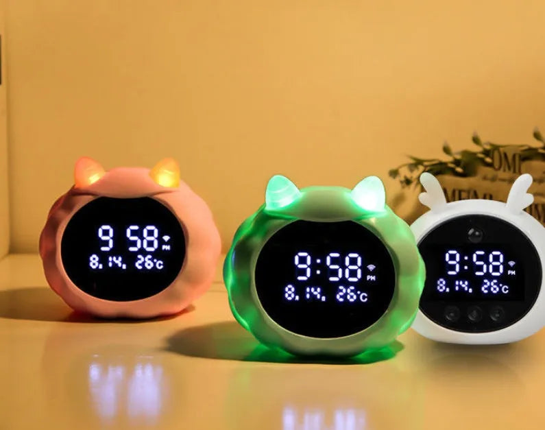 Silicone smart alarm clock with voice control and human body induction, shown in a white deer style.