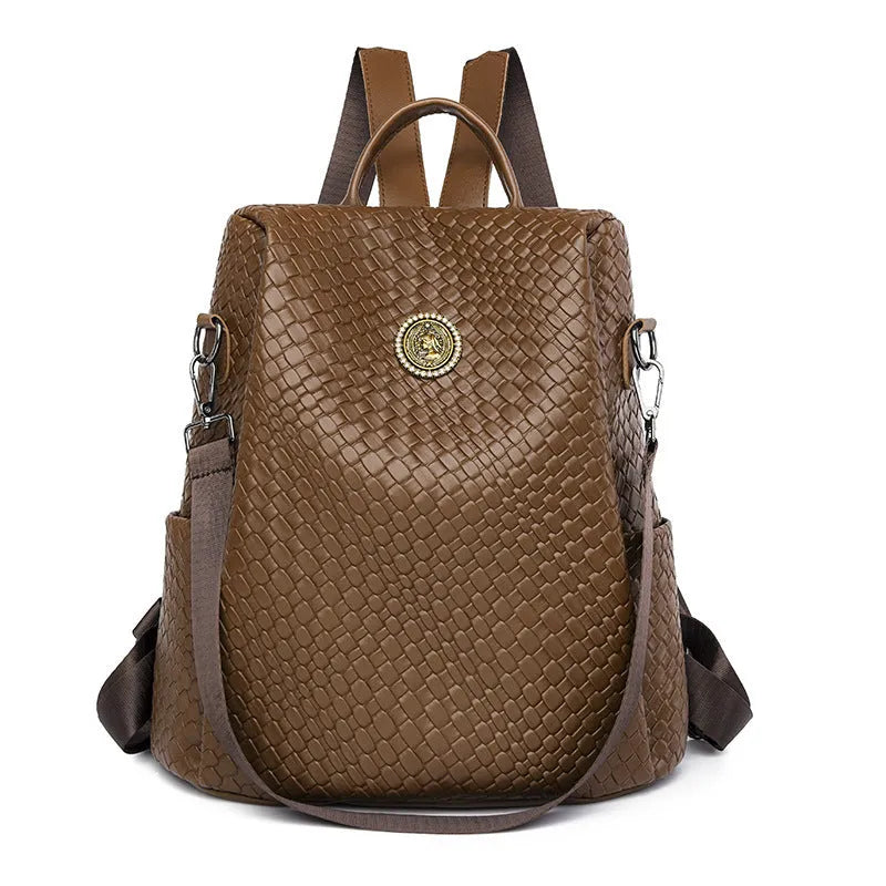 Women's black anti-theft backpack with organisational compartments and urban design details
