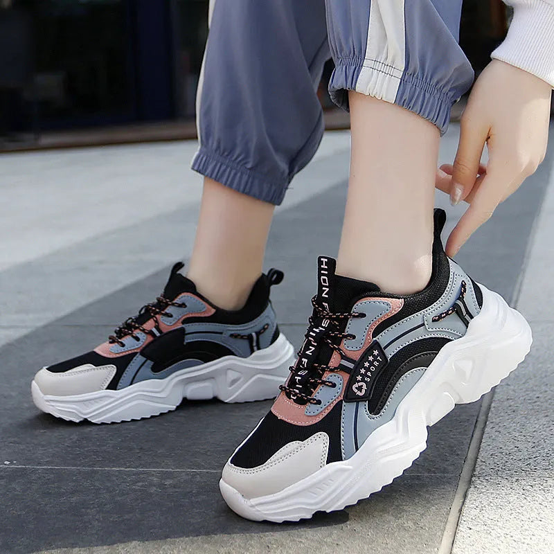 White women's casual sports shoes with mesh upper, buckle closure, and thick PU sole
