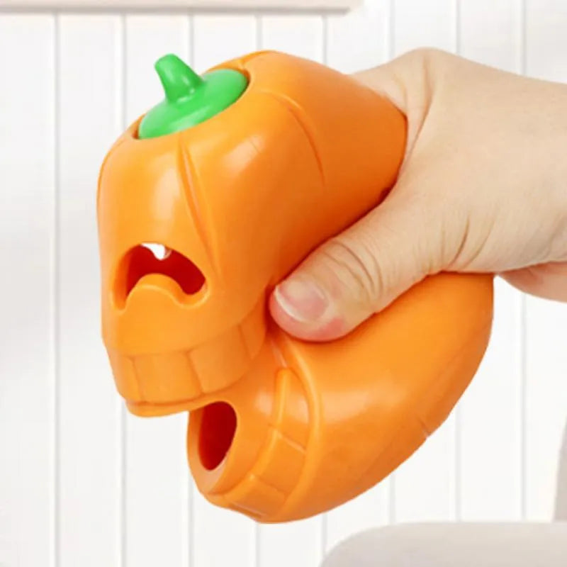 Yellow pumpkin-shaped TPR dog chew toy for aggressive chewers.