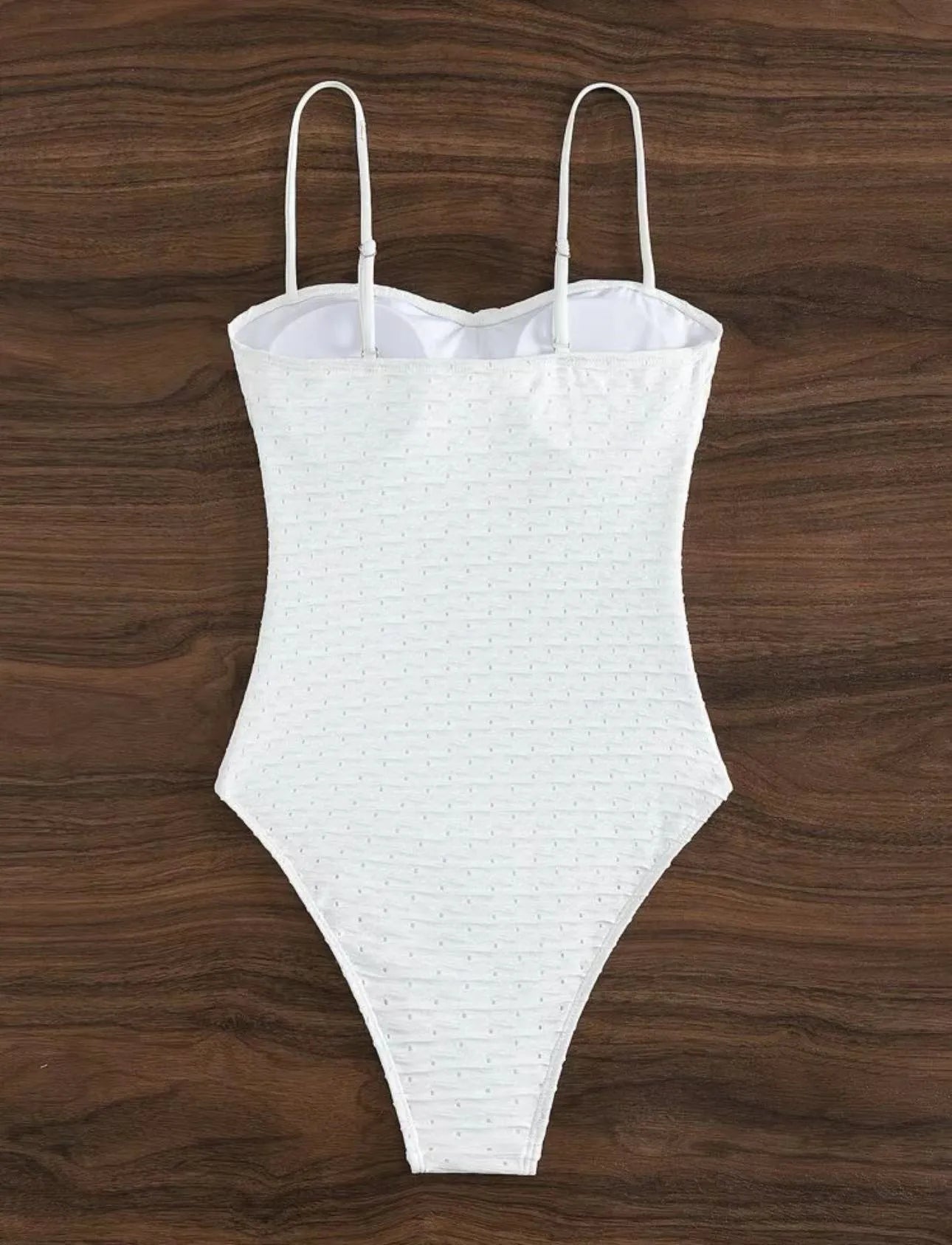 White women's one-piece swimsuit with sling brief style and quick-drying polyester fabric