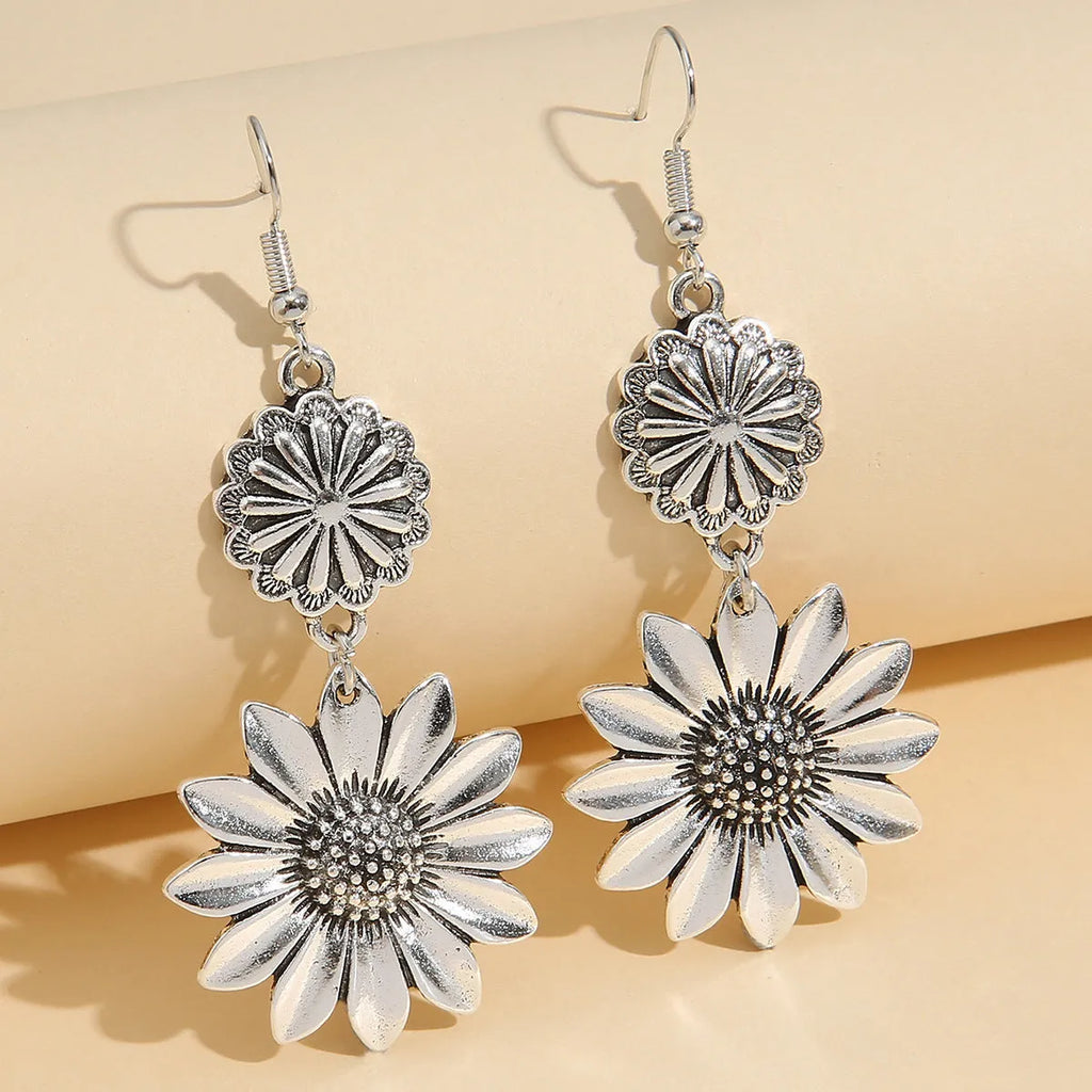 Retro sunflower earrings in silver or gold zinc alloy with a flower shape for women