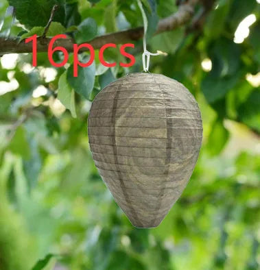 A collapsible paper and wire beehive lantern measuring 22 by 28 centimetres in a photo colour finish.