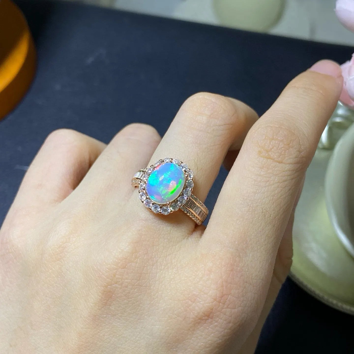 Pure natural opal handmade sterling silver adjustable ring showing rose gold finish and opening design
