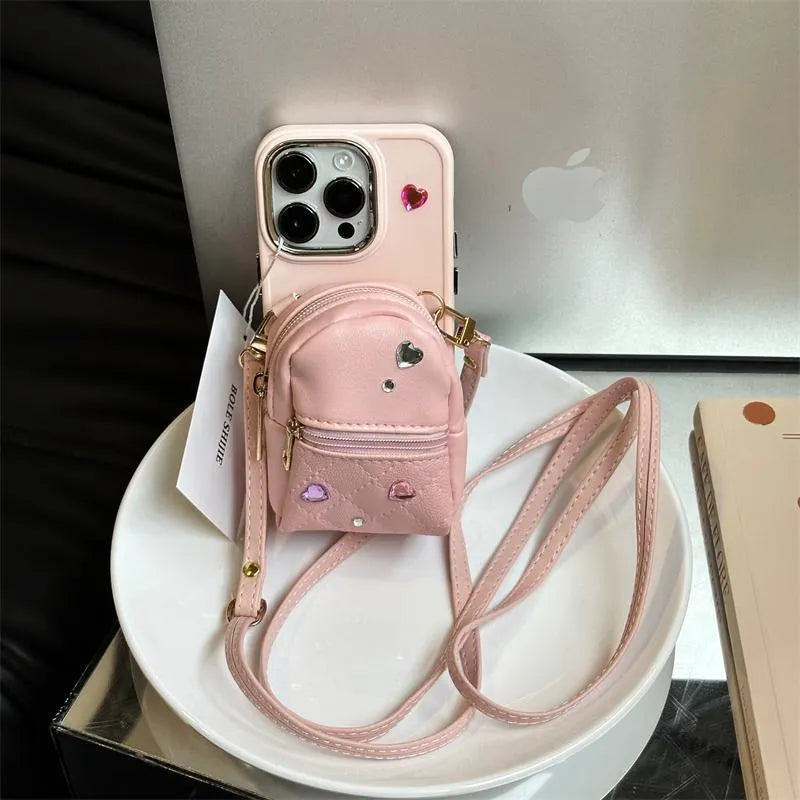 Crossbody wallet phone case with rhinestone design and removable shoulder strap in antique white