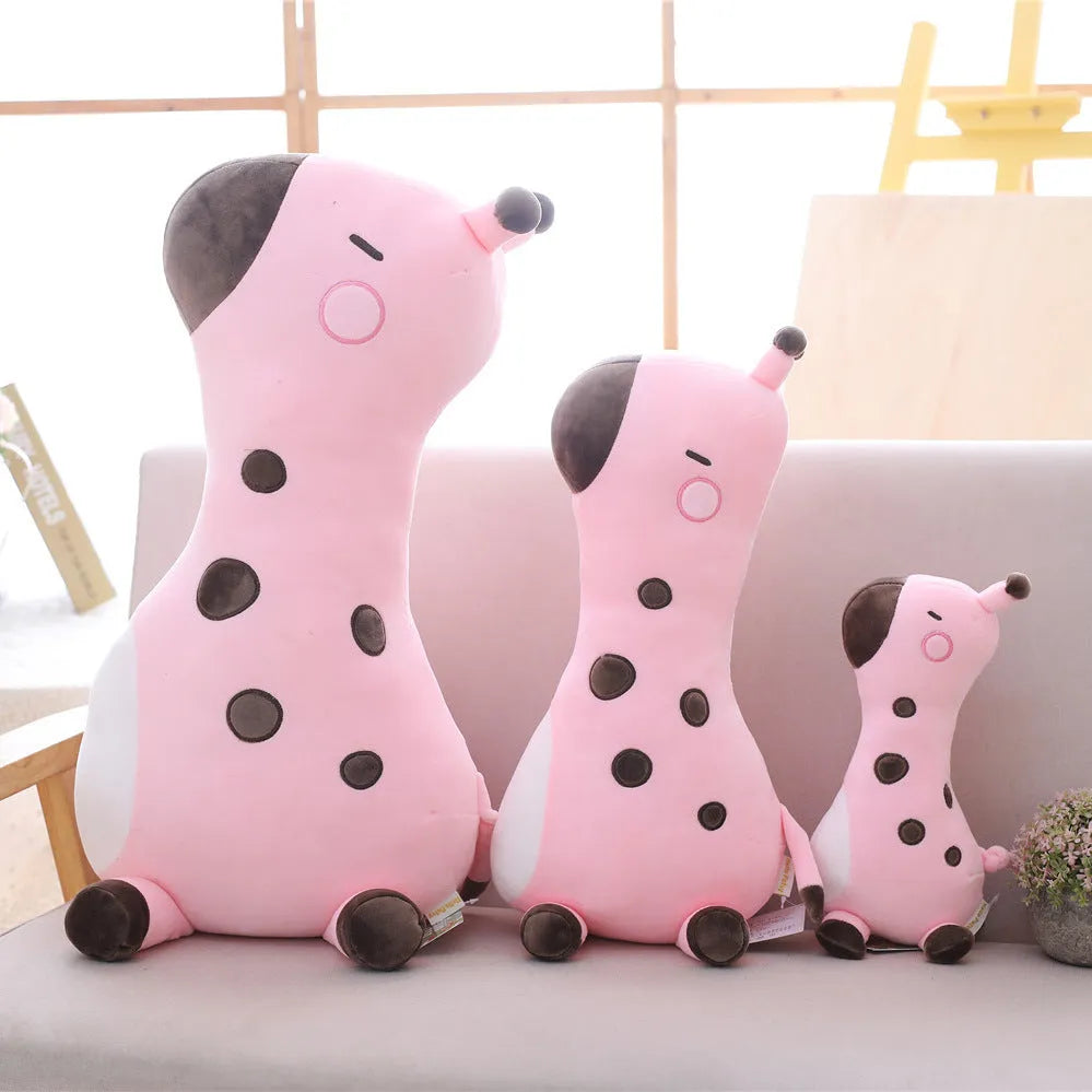 Pink Sika Deer plush doll with short plush fabric, 30cm tall, on a bed