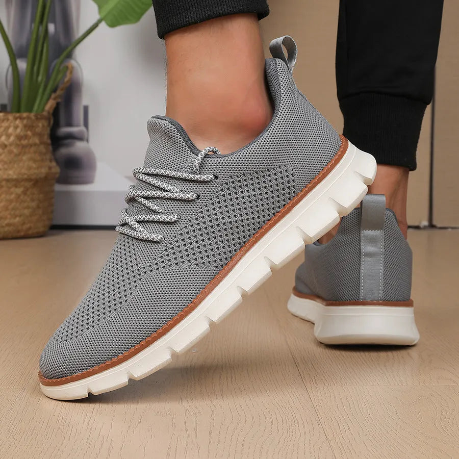 Men's grey mesh fabric casual sneakers with round toe and low heel design