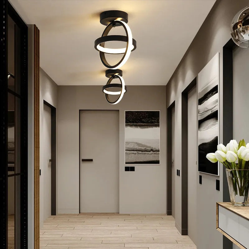 Modern round ceiling light in black or white with 21cm diameter and LED light source