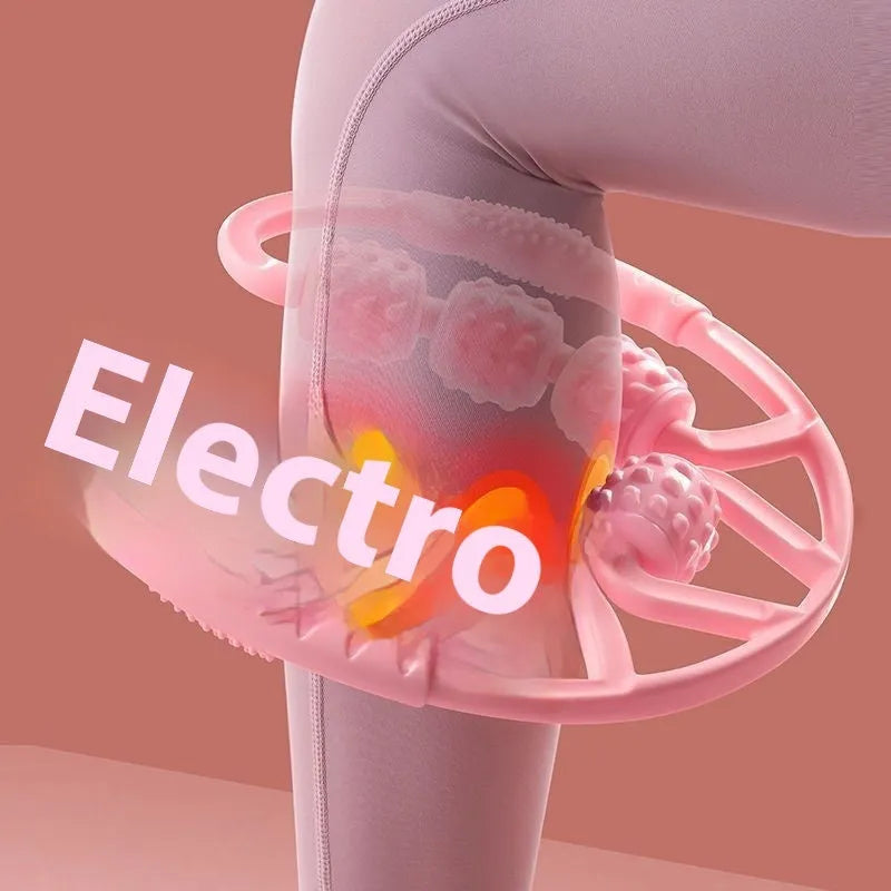 A pink manual leg massager roller with twelve wheels and black ring clips for securing to the leg.