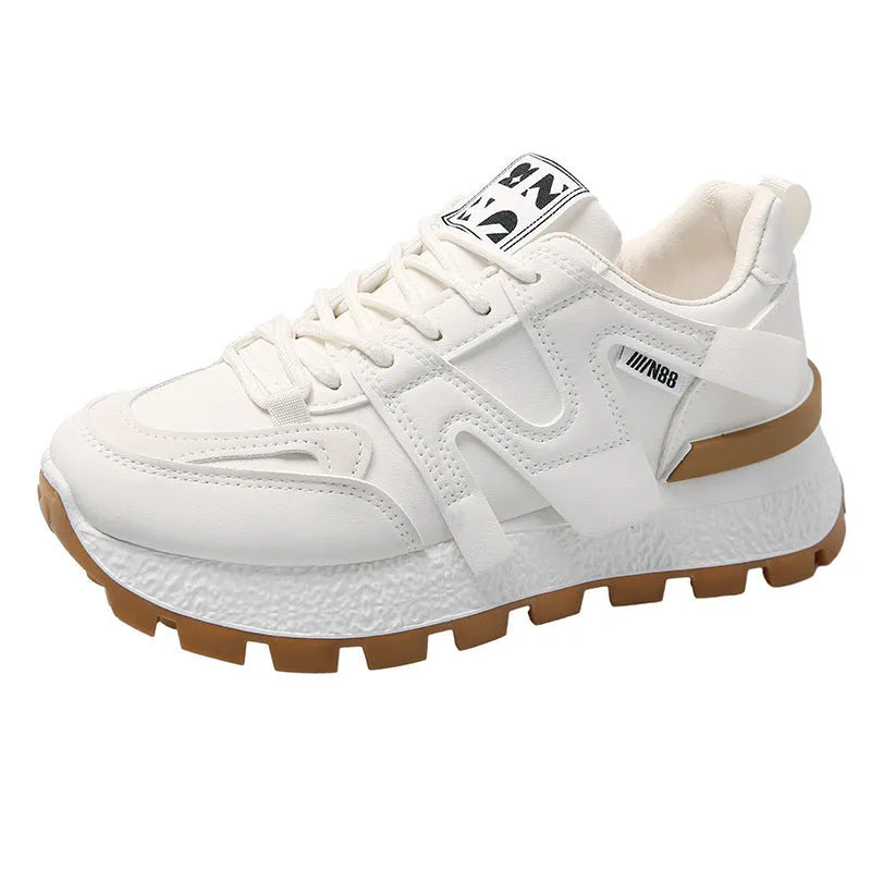 Women's low-top sneakers in white or black with artificial PU upper and rubber sole