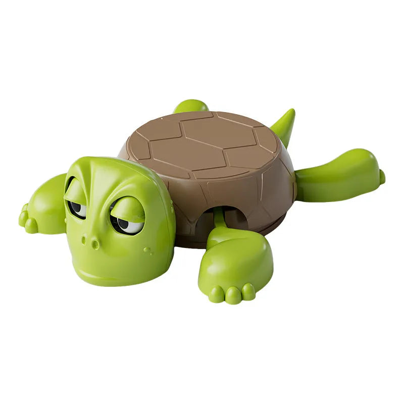 ABS plastic turtle coaster in green shape on desk with a glass of water nearby