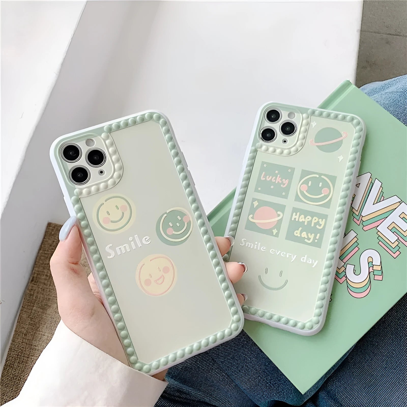 Green TPU phone case with geometric smiley face and polka dot pattern for multiple iPhone models.