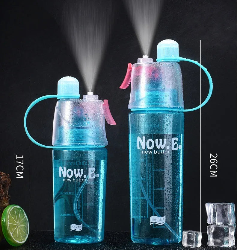 Green portable sports mist spray cup with handle, leakproof lid, and visible scale, shown next to a black version.