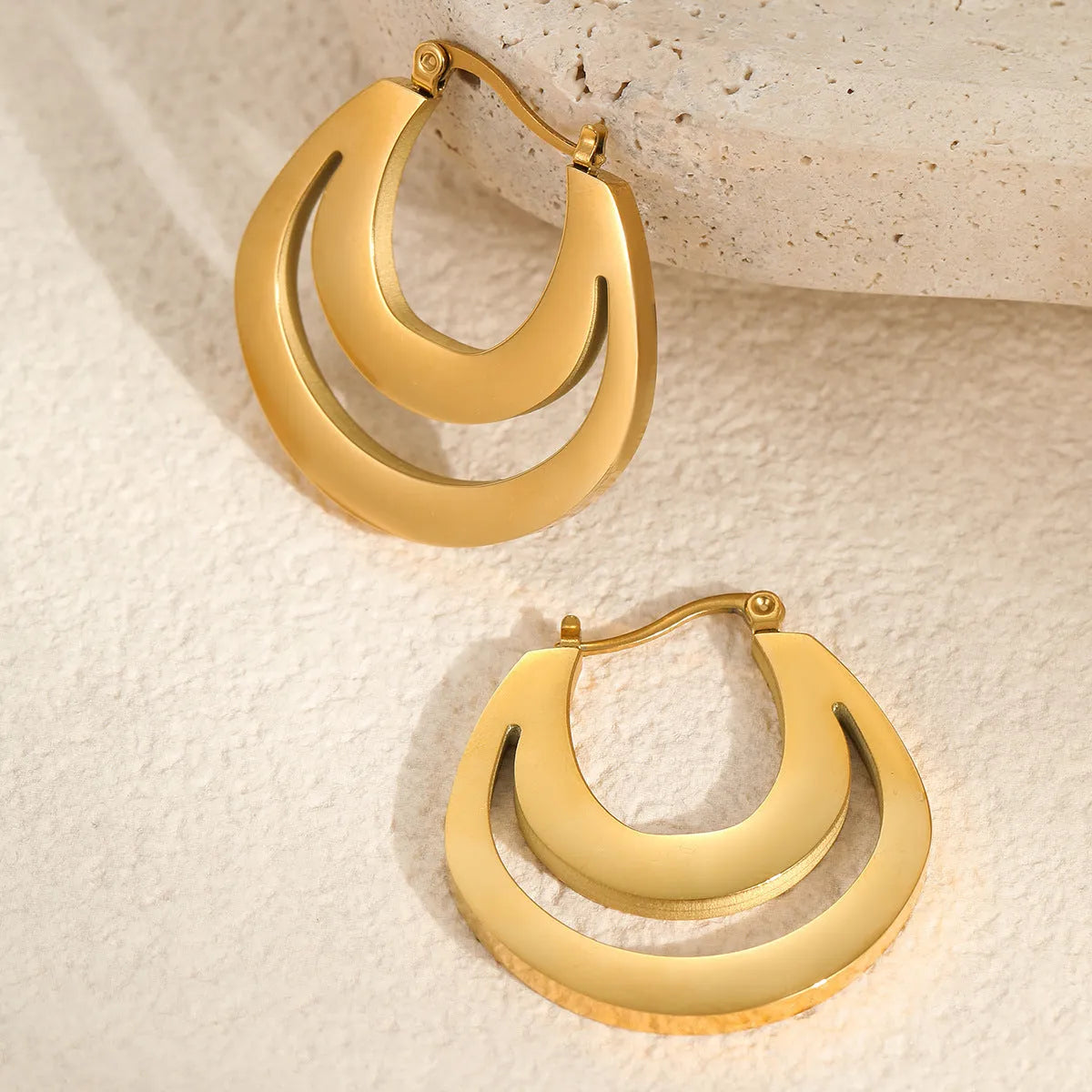 Gold plated geometric French earrings with round ring design on stainless steel with 18K purity plating
