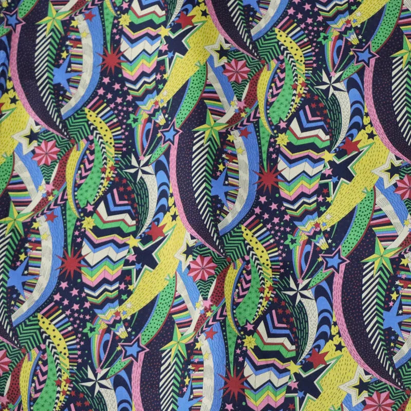 Blue plant and flower pattern on 100% cotton fabric, showing the 145 cm width.