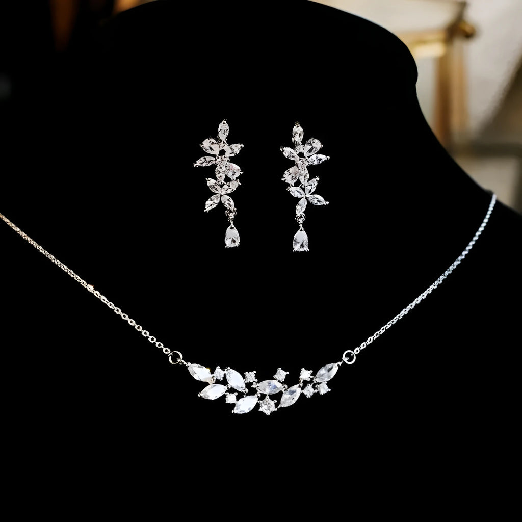 Silver alloy necklace and earrings set with zircon leaf design for bridal weddings