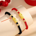 Hand-woven Swallowing Gold Beast couple's bracelet in black or red with three-dimensional decoration