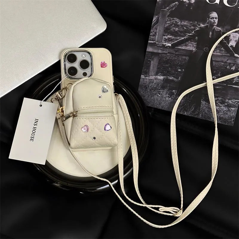 Crossbody wallet phone case with rhinestone design and removable shoulder strap in antique white