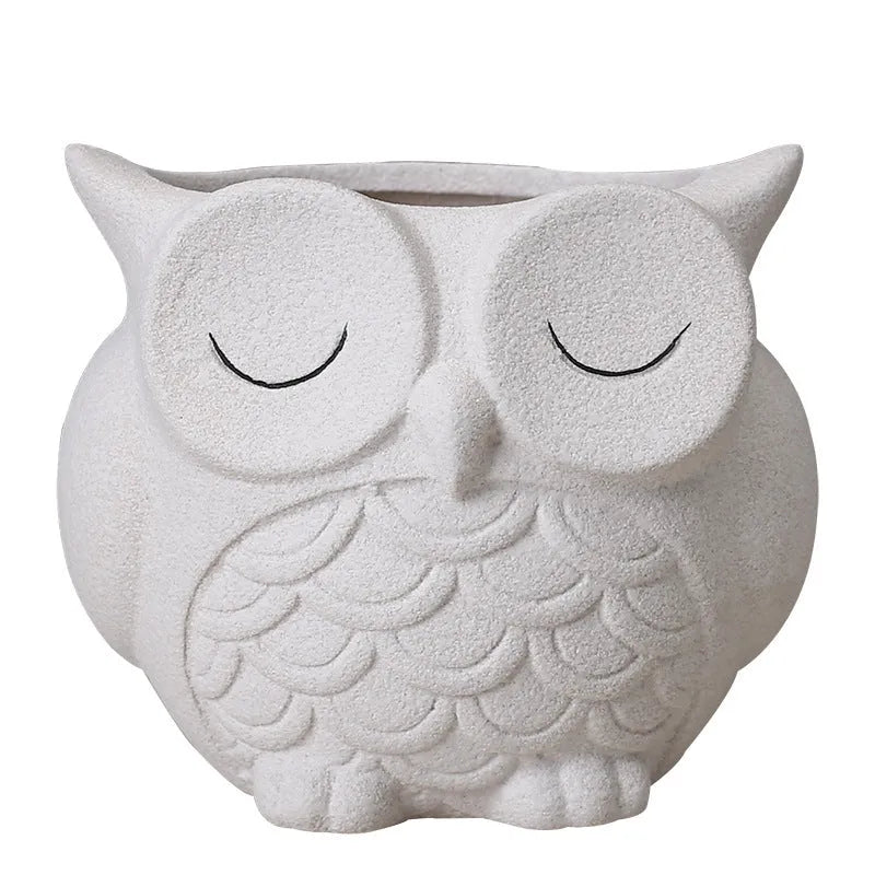 Handmade ceramic succulent pot with cartoon owl design in frosted pastel colour