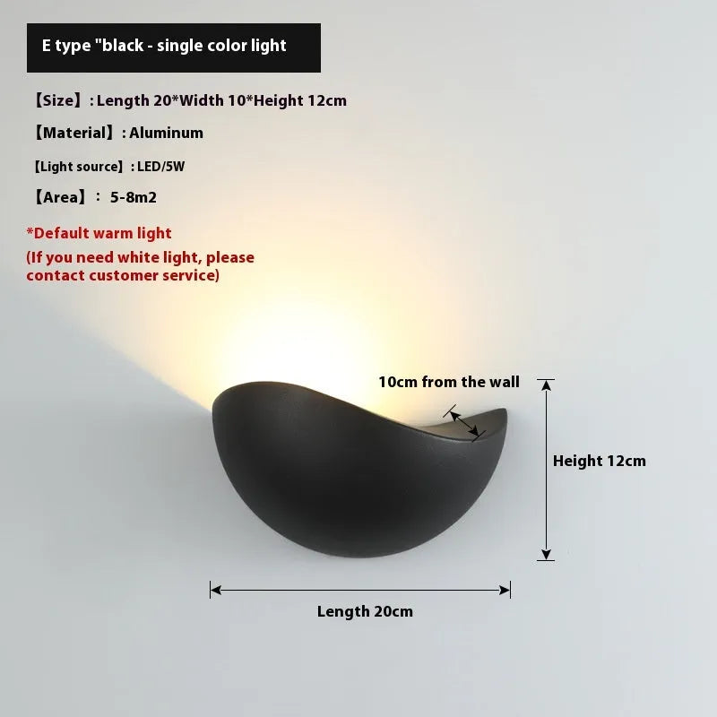 Black bird's nest style aluminium alloy LED lamp with warm white glow.