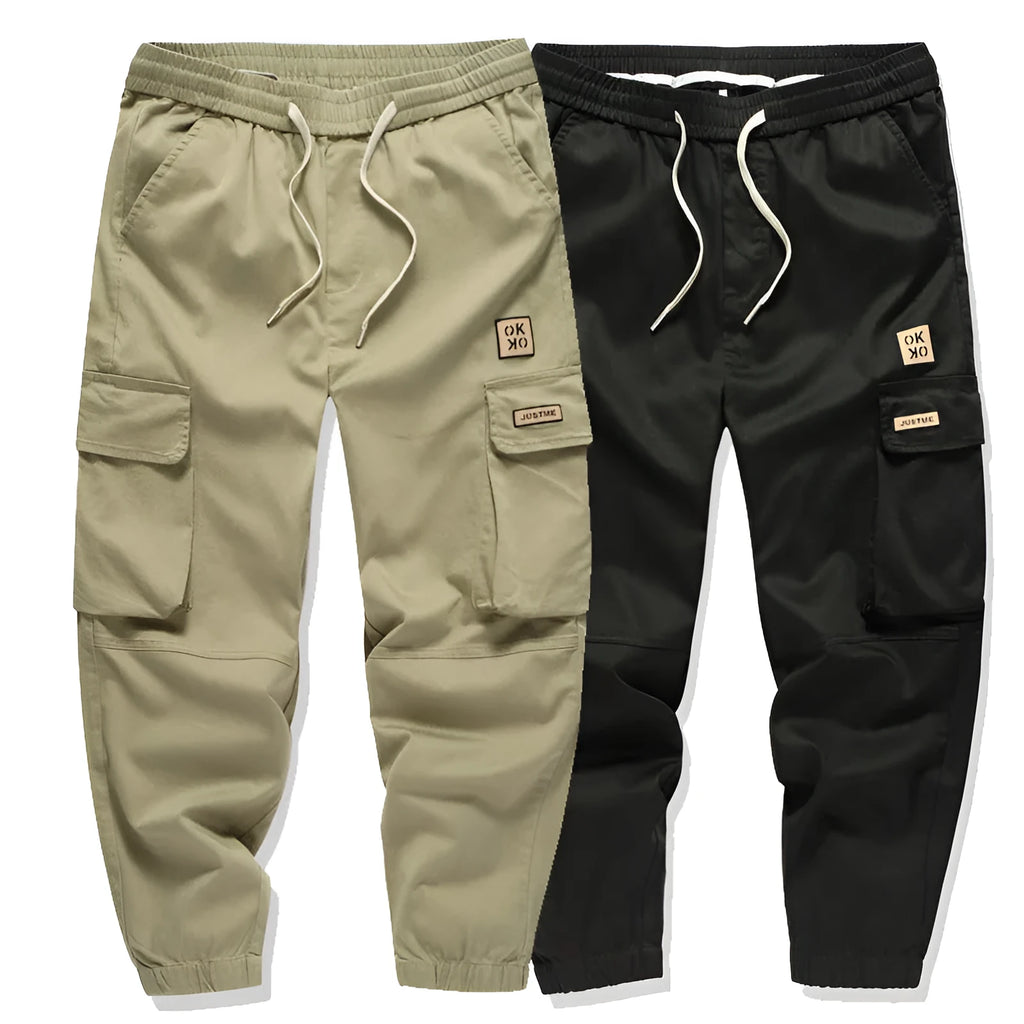 Men's multi bag pants in black, loose fit with multiple pockets, 80% polyester casual trousers