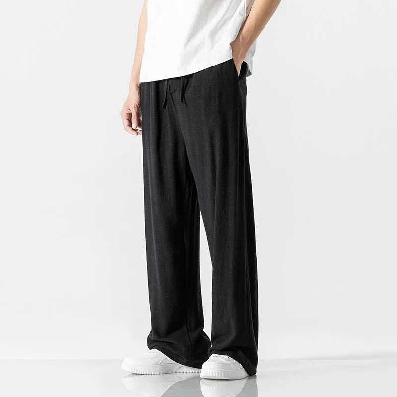 Men's bamboo fibre linen trousers with cropped length and elastic drawstring waist in beige colour