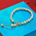Natural Hetian jade pearl pendant women's bracelet with gold electroplated Chinese style design