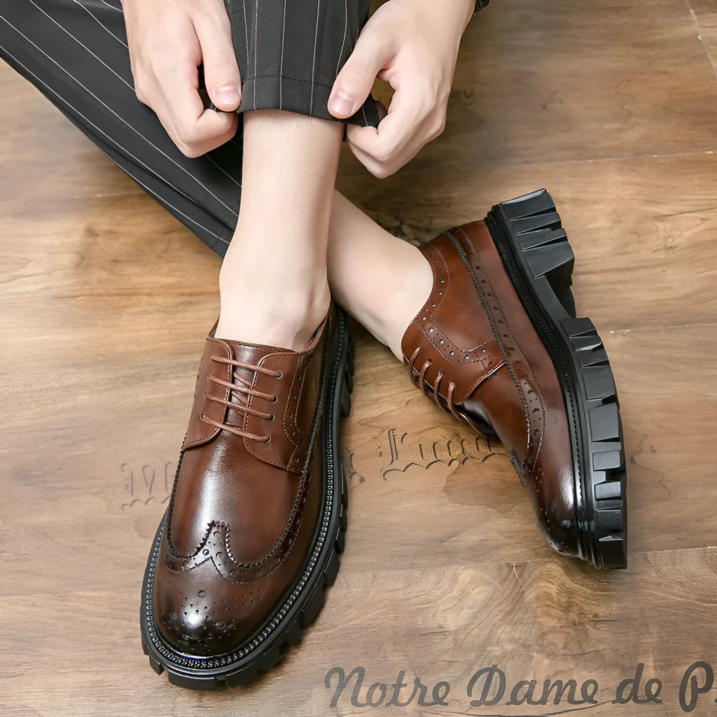 Men's black artificial PU brogue shoes with round toe and decorative perforations on a white background.