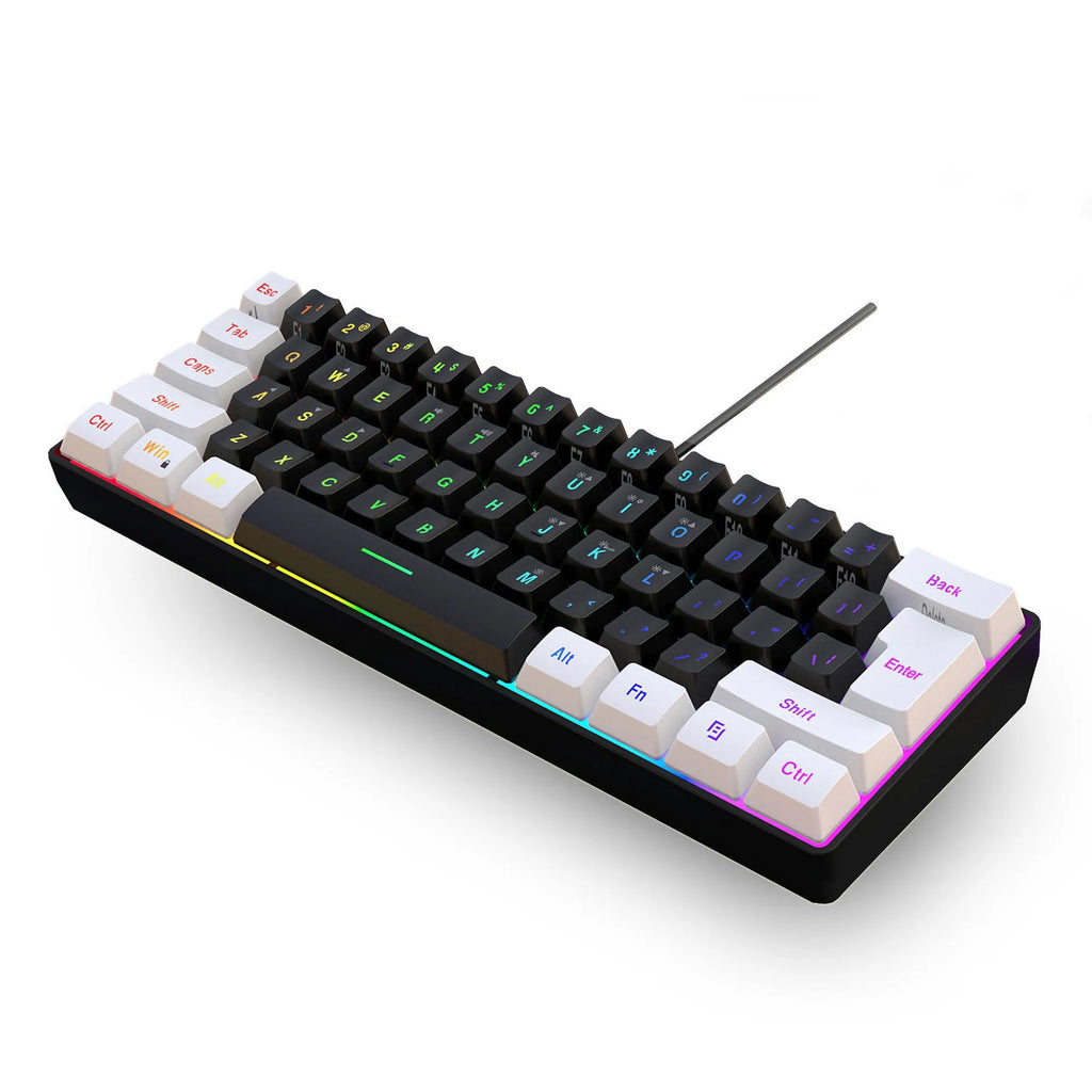 White and black wired 61-key USB membrane keyboard on a desk next to a laptop.