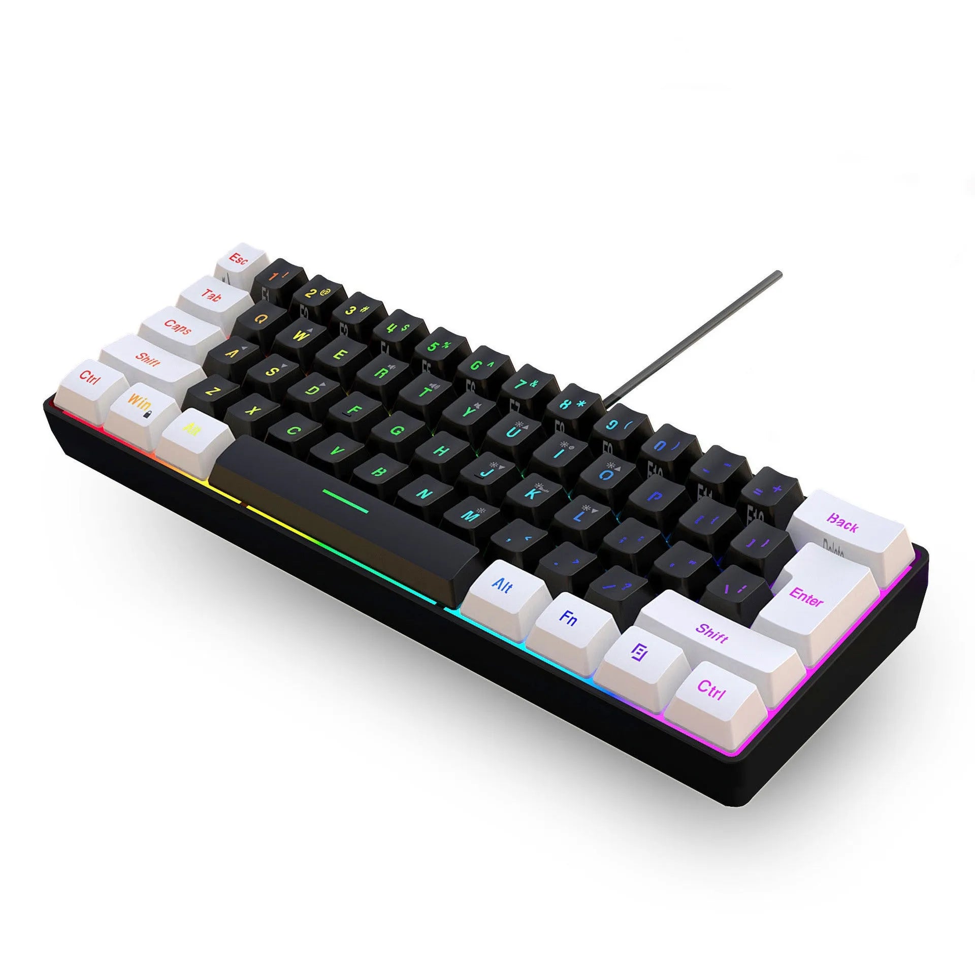 White and black wired 61-key USB membrane keyboard on a desk next to a laptop.