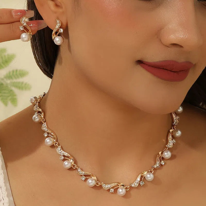 Women's bohemian irregular pearl earrings and necklace set in gold alloy electroplated finish