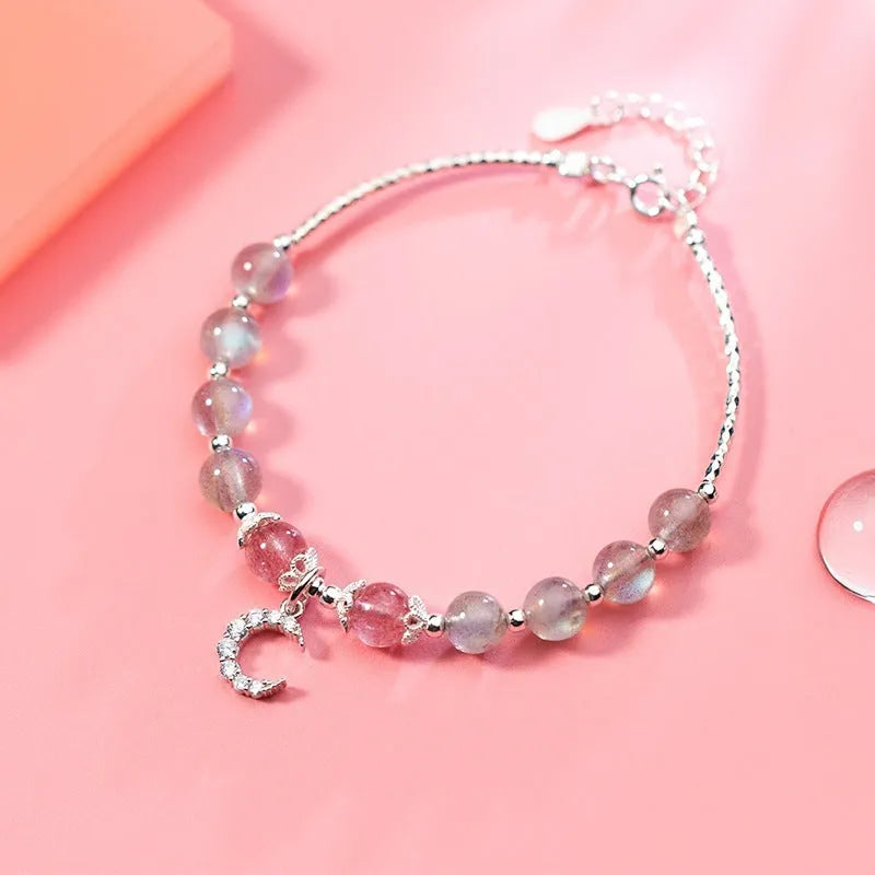 Handmade adjustable moonstone bracelet with 6mm stone and crescent moon charm on silver chain