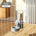 1.2L grey automatic pet feeder and 520ml water dispenser set with hanging cage design for small puppy, cat, or rabbit.