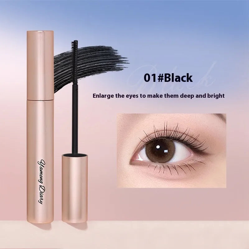 Close-up of a long-lasting curling mascara tube and wand in black or brown.