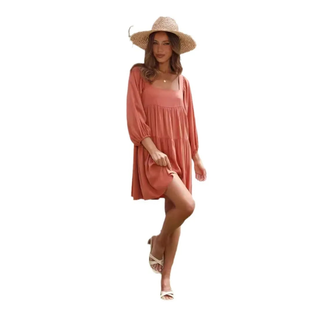Light blue square collar puff sleeve backless A-line dress for a girl on a hanger.